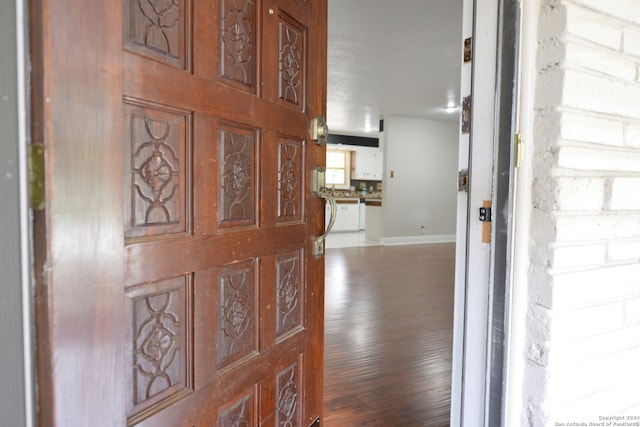 foyer entrance featuring hardwood / wood-style flooring