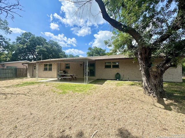 back of house featuring a patio