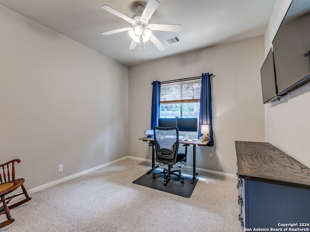 office space featuring ceiling fan and carpet flooring