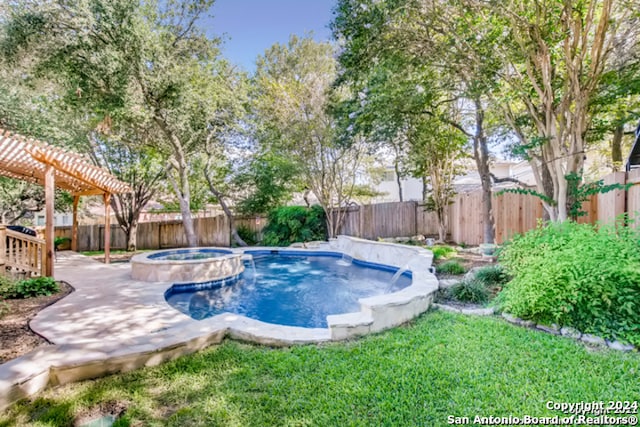 view of swimming pool with a patio area, a fenced backyard, a pool with connected hot tub, and a pergola