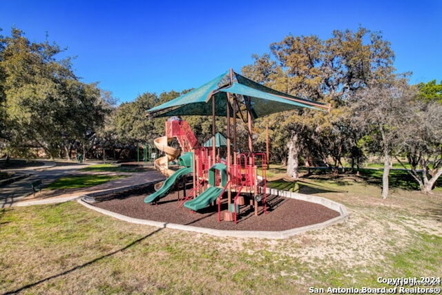 view of play area featuring a yard