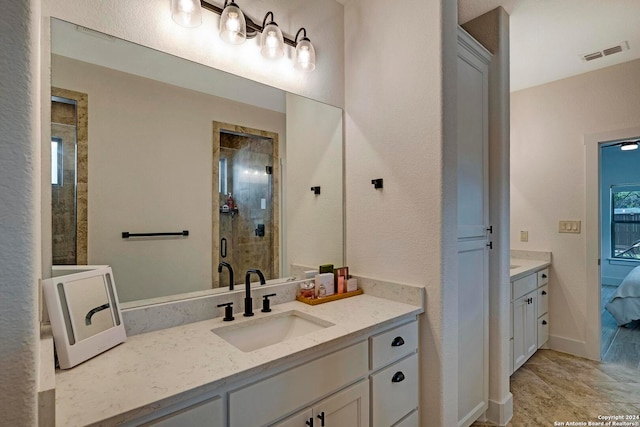 bathroom featuring vanity and tile patterned floors