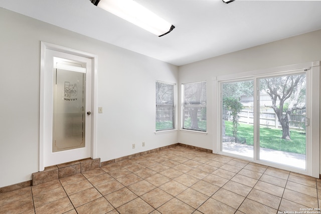 view of tiled spare room