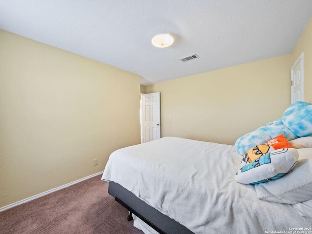 bedroom featuring carpet