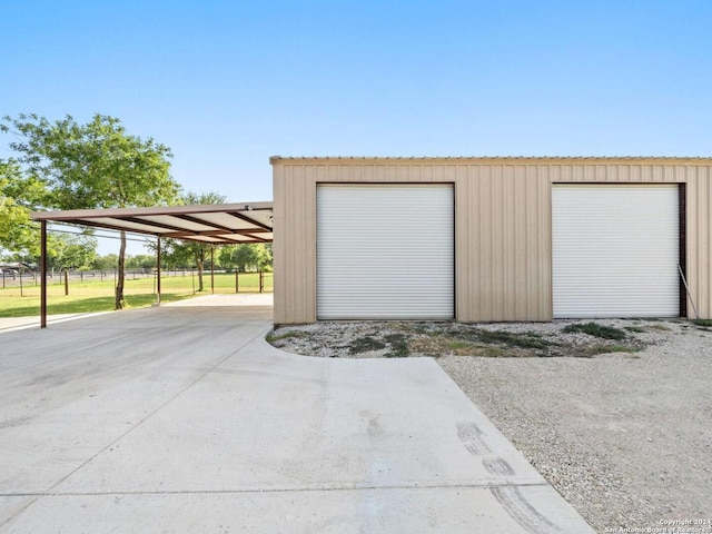 garage with a carport