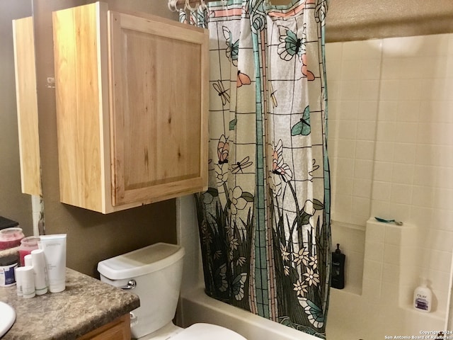 full bathroom with vanity, shower / tub combo, a textured ceiling, and toilet