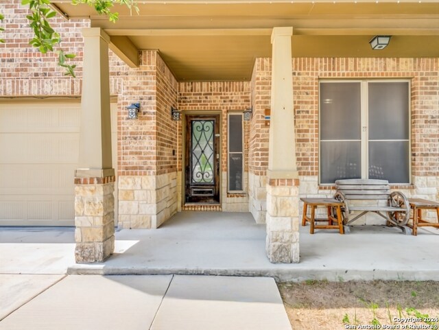 property entrance featuring a garage