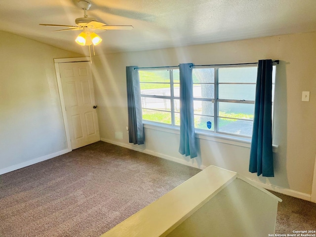 unfurnished bedroom with carpet floors and ceiling fan