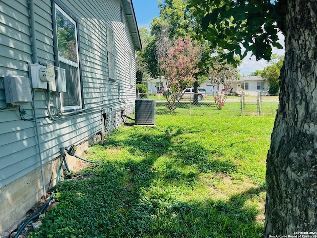 view of yard featuring central AC