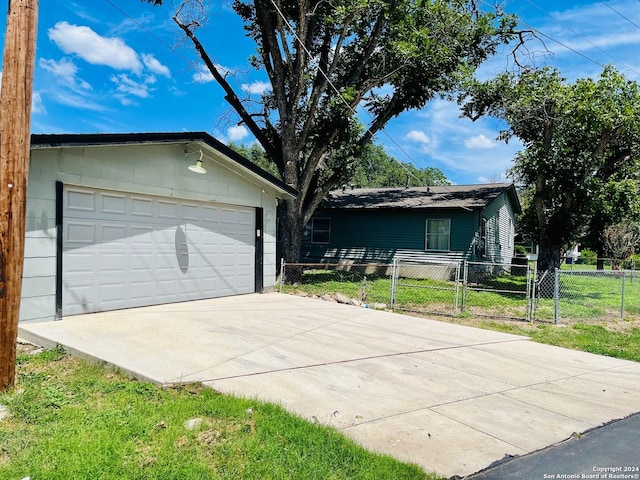 view of front of home with a garage