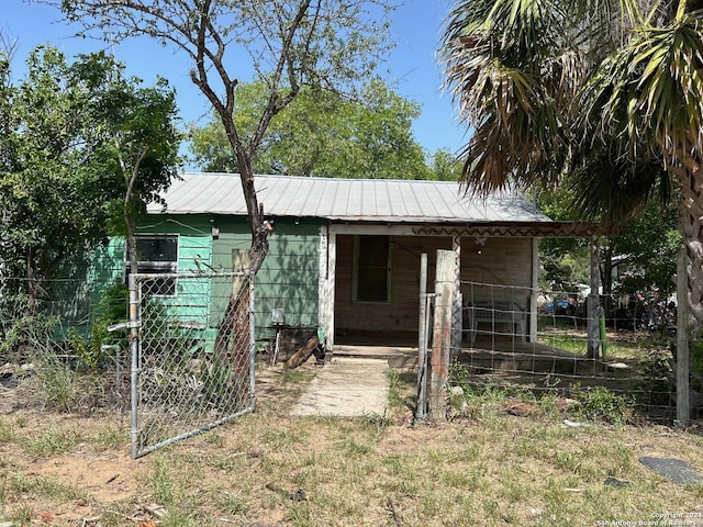 view of outdoor structure featuring fence