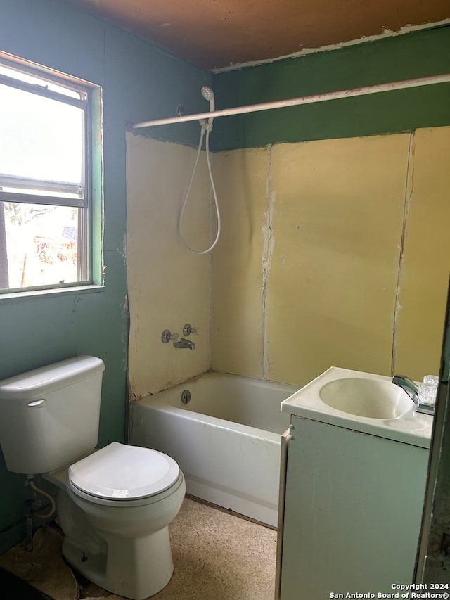 full bathroom featuring shower / bath combination, vanity, and toilet