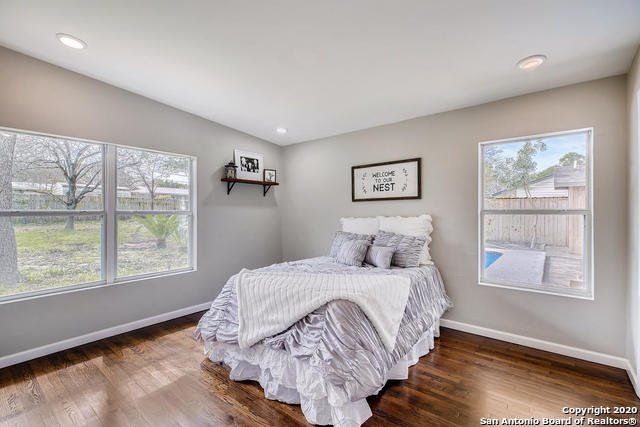 bedroom featuring dark hardwood / wood-style floors