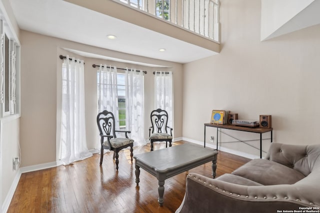 sitting room with hardwood / wood-style floors