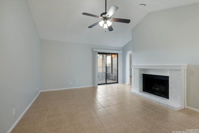 unfurnished living room featuring a brick fireplace, light tile patterned floors, and ceiling fan