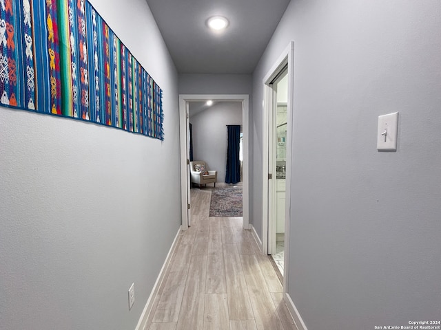 hallway featuring light hardwood / wood-style floors