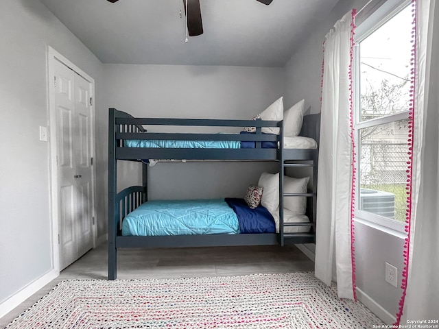 bedroom featuring ceiling fan and light wood-type flooring