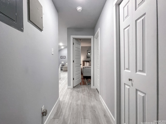 corridor featuring light wood-type flooring