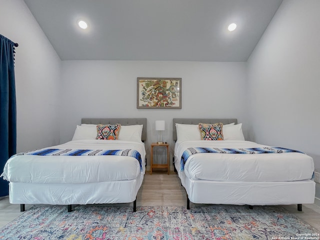 bedroom featuring light wood-type flooring