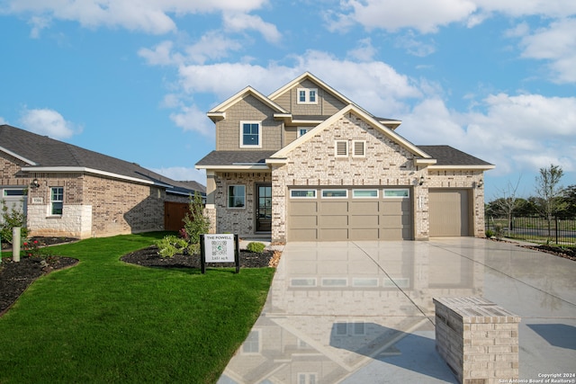 craftsman-style house with a front lawn