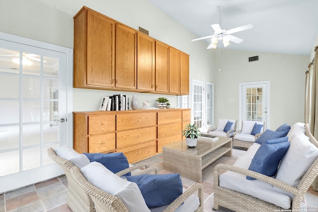 sitting room featuring high vaulted ceiling, ceiling fan, a healthy amount of sunlight, and light tile patterned floors