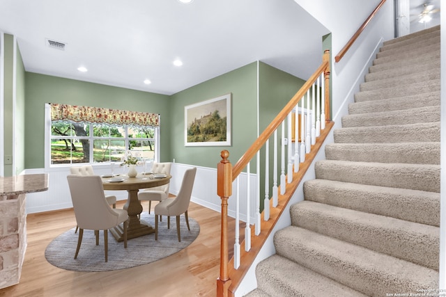 dining area featuring light wood-type flooring