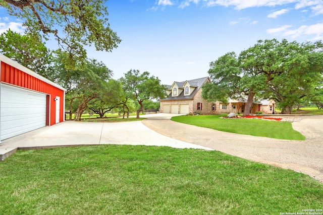 view of yard with a garage