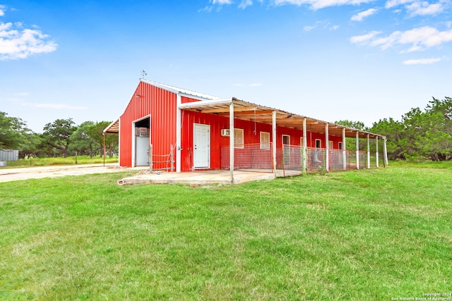 exterior space with a garage and a yard