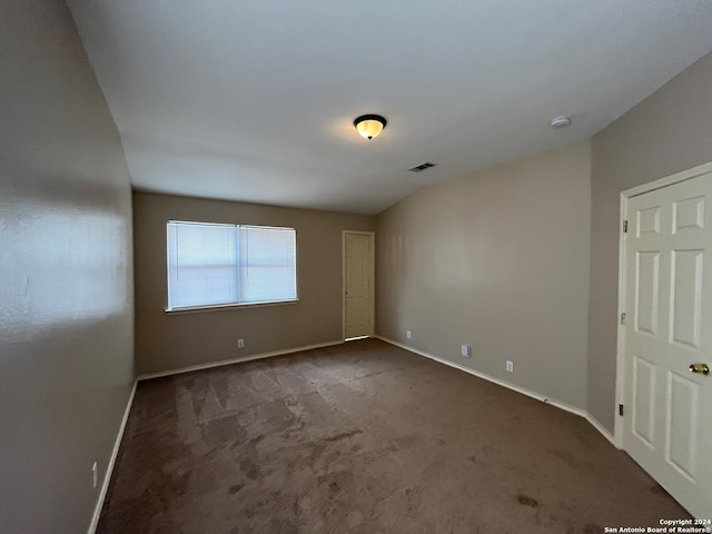 spare room featuring carpet flooring