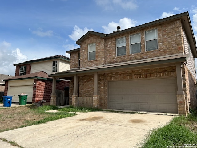 view of front of home with a garage