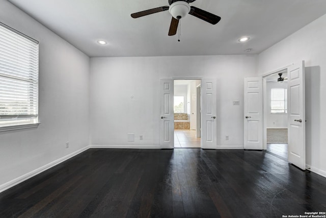 spare room featuring dark hardwood / wood-style flooring