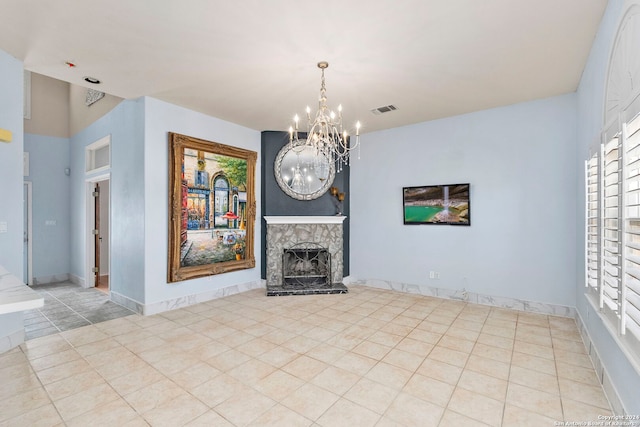 unfurnished living room featuring a fireplace with raised hearth, light tile patterned floors, visible vents, and baseboards