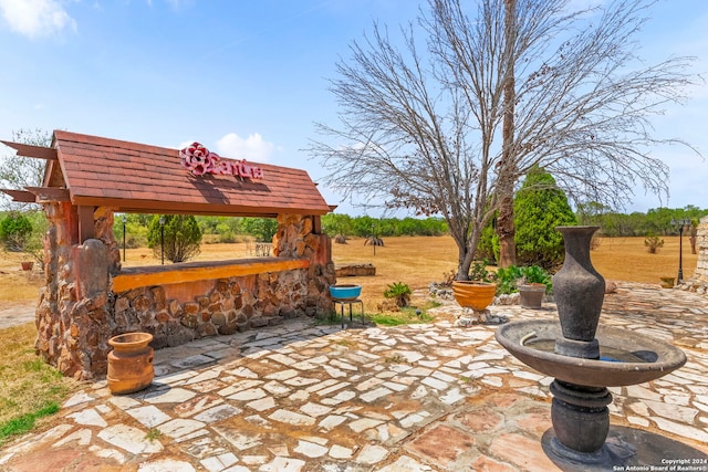 view of patio / terrace featuring a rural view