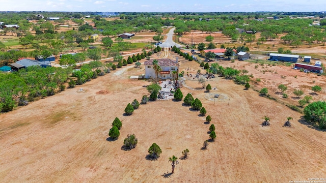 birds eye view of property featuring a rural view