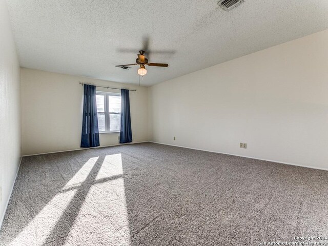 full bathroom with double vanity, a sink, a shower stall, wood finished floors, and baseboards