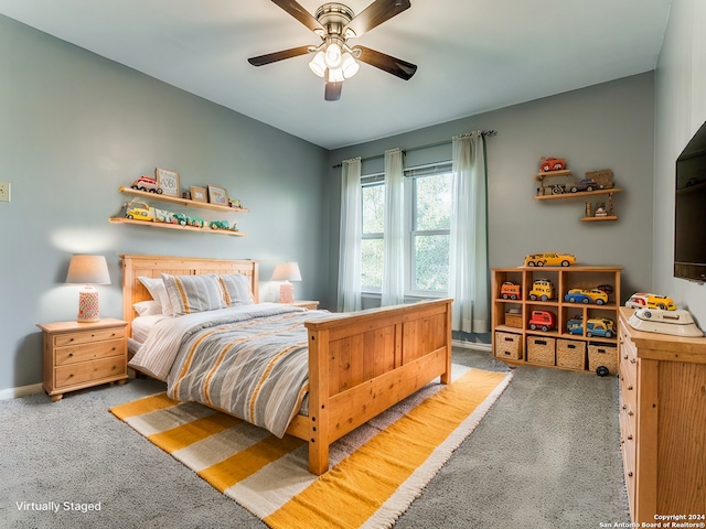 bedroom with baseboards, a ceiling fan, and light colored carpet