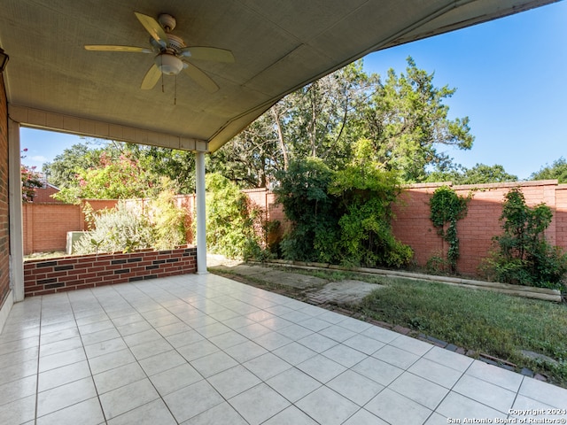 view of patio / terrace with ceiling fan and a fenced backyard