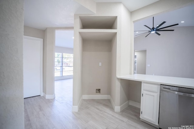 kitchen with ceiling fan, stainless steel dishwasher, light hardwood / wood-style flooring, and white cabinets