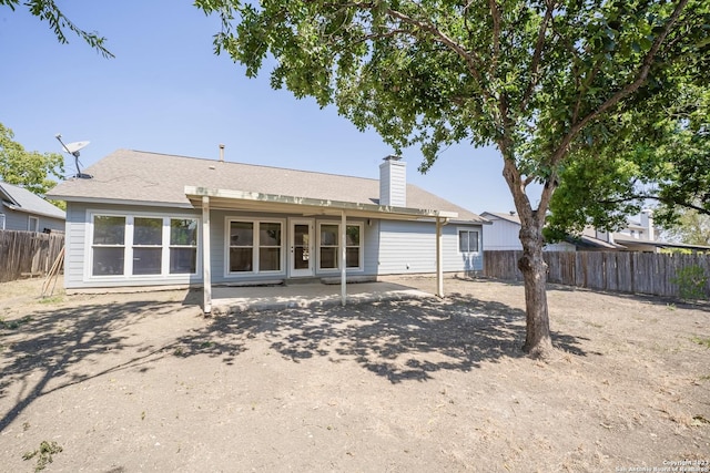 back of house featuring a patio area