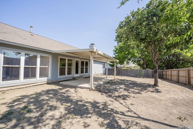 rear view of property with a patio area