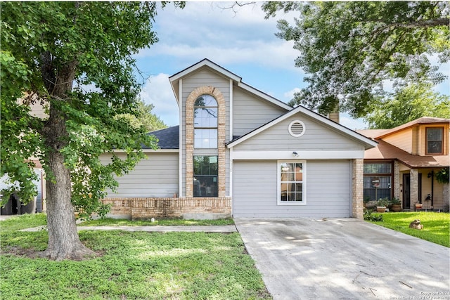 9330 Village Lance, San Antonio, TX 78250 - view of front of house with a front lawn
