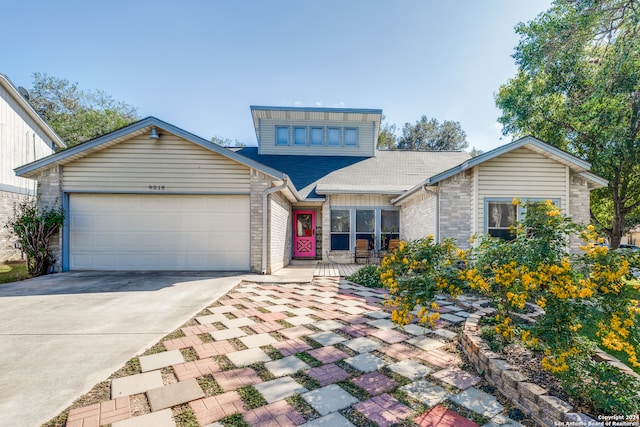 view of front of property featuring a garage