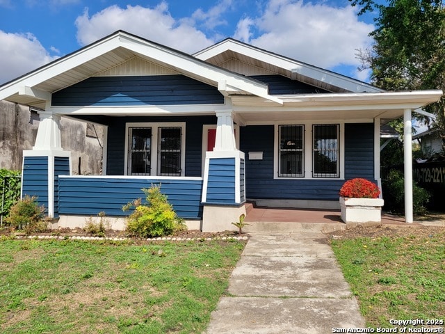 bungalow-style home featuring a porch