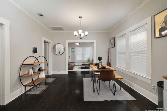 kitchen featuring wall chimney range hood, white cabinets, wood counters, appliances with stainless steel finishes, and sink