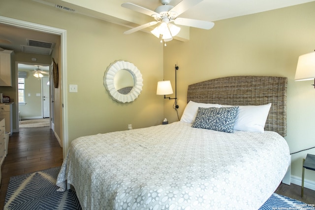 bedroom featuring ceiling fan and hardwood / wood-style floors