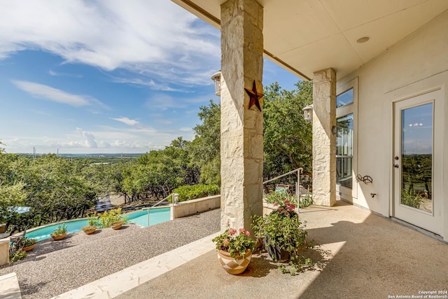 24434 Blanco Rd, San Antonio, TX 78260 - view of patio / terrace with an outdoor pool