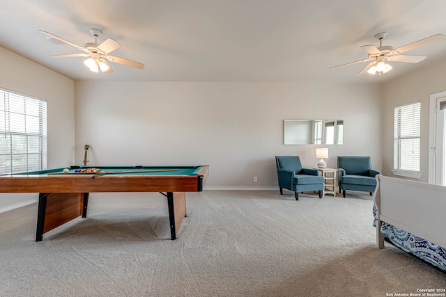 recreation room featuring billiards, a healthy amount of sunlight, ceiling fan, and light colored carpet