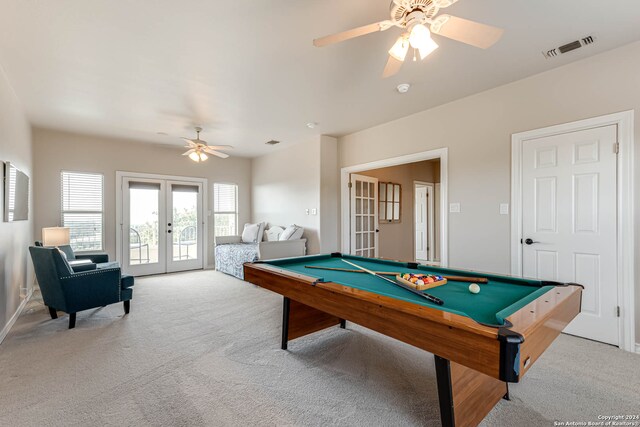 rec room featuring light carpet, french doors, billiards, and ceiling fan