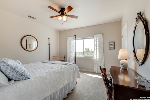 bedroom with light carpet and ceiling fan