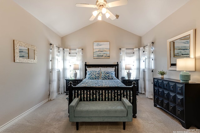 carpeted bedroom with high vaulted ceiling and ceiling fan